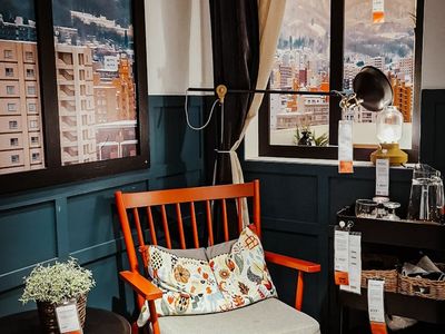 Soft morning sunlight hitting a cozy room corner.